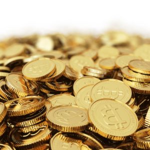 Pile of gold Bitcoin with white background