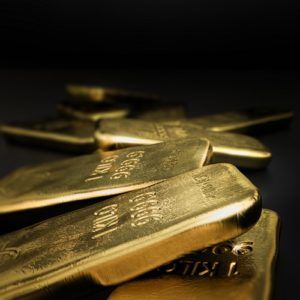 Gold bars on black background