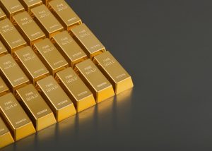 Rows of gold bars on a dark grey background