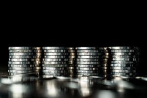 Four stacks of Silver coins 