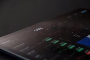 laptop stock chart image on dark background
