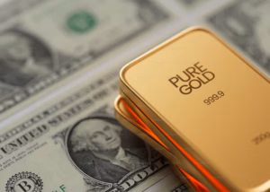 Gold bar and a dollar bill