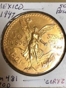1947 50 peso coin obverse displaying lustrous surfaces and sharp strike details of Angel of Independence design.