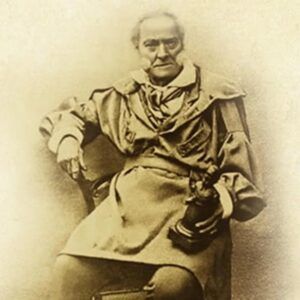 Historical photograph of Benedetto Pistrucci seated in formal 19th-century attire.