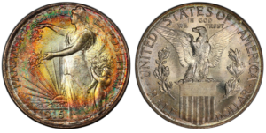 Both sides of the 1915-S Panama-Pacific Exposition silver half dollar showing Columbia scattering flowers with a child on the obverse and an eagle perched on a Union Shield on the reverse, with richly toned surfaces.