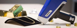 Handheld XRF device testing precious metals for purity verification