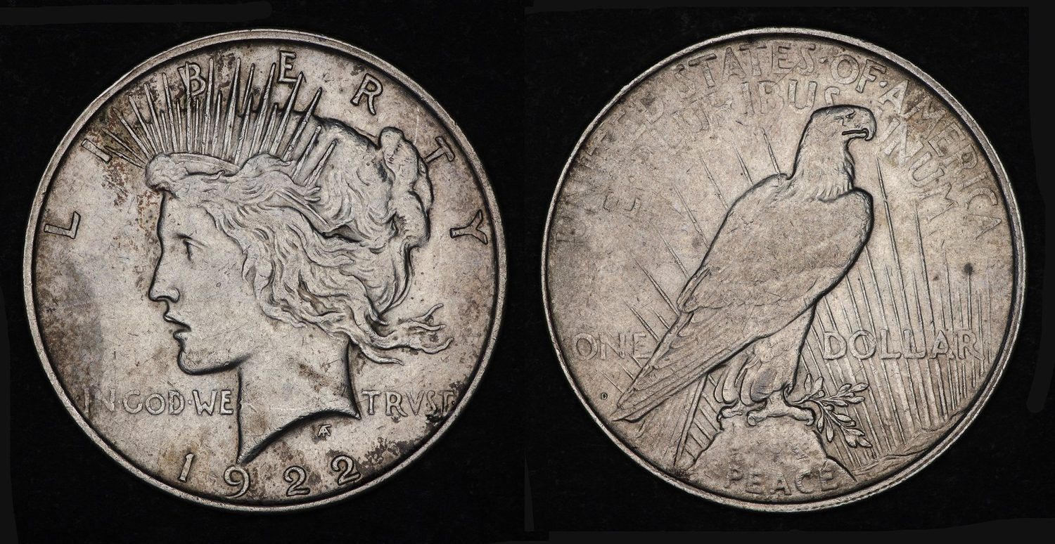 Obverse and reverse of a 1922-D Peace silver dollar, showing Liberty in left profile with a radiate crown and the eagle at rest on a rock